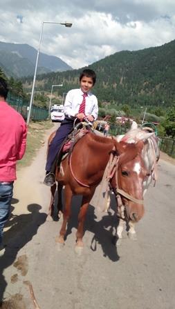 Student of AGS Wuzur enjoying Horse Riding in Pahalgam with zeal.